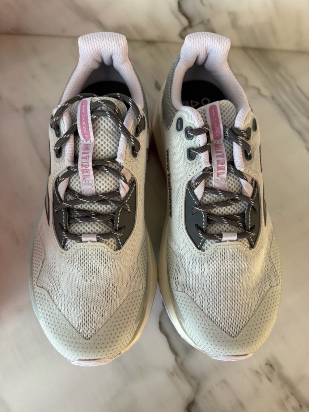 New Balance Women’s Trail Sneakers in Light Gray and Pink
